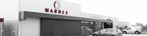 Exterior of the Marble Automation building in Urk, in black and white